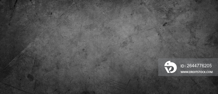 Dark grey textured concrete grunge wall background