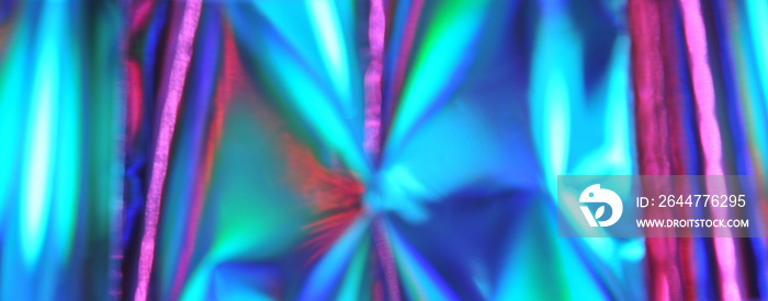 Blurred holographoc foil texture.