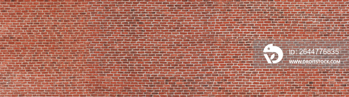 Red brick wall. Texture of old dark brown and red brick wall panoramic backgorund.