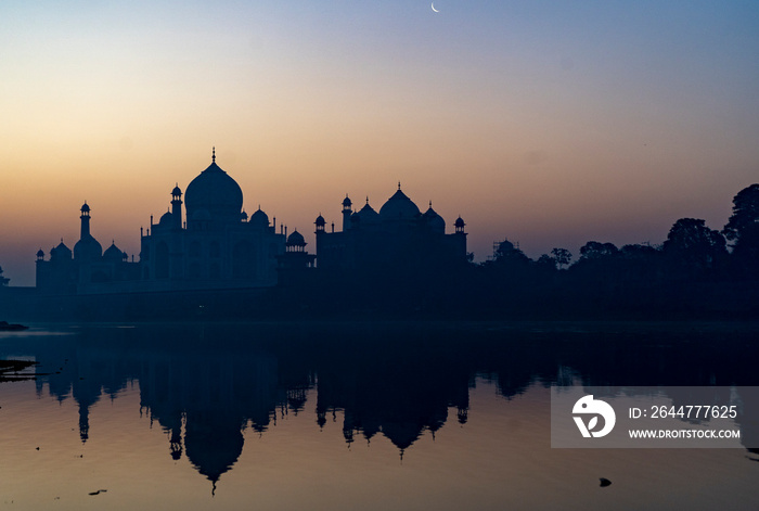 aj Mahal mausoleum reflected in Yamuna river - Agra, Uttar Pradesh, India