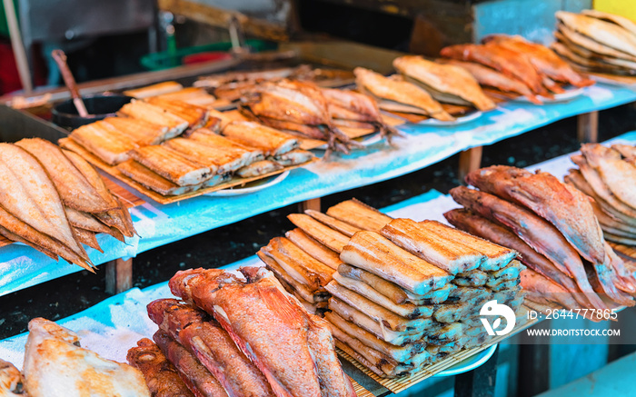 Smoked fish at market Jagalchi in Busan reflex