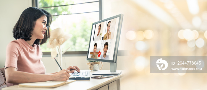 Asian business woman talking to colleague team about plan in video conference. Group of multiethnic business people using computer for online meeting in video call conference. Smart working from home.