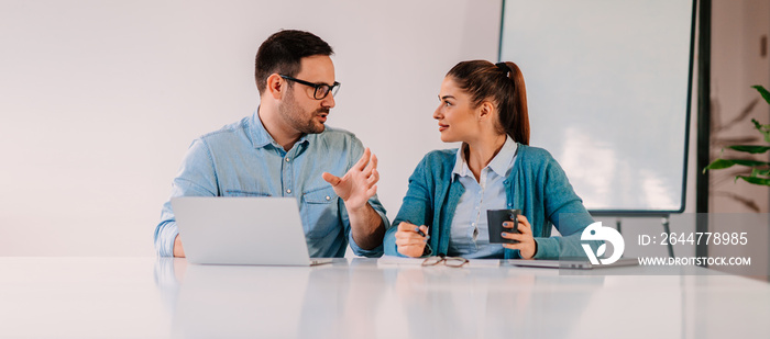 Coworkers discussing in the office