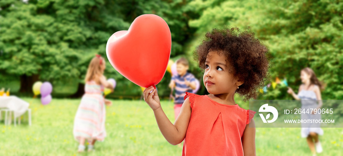 childhood, expressions and emotions concept - happy little african american girl with red heart shap