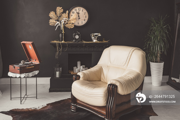 Retro vintage interior. Retro living room interior in dark black colors. Retro leather chair and fir