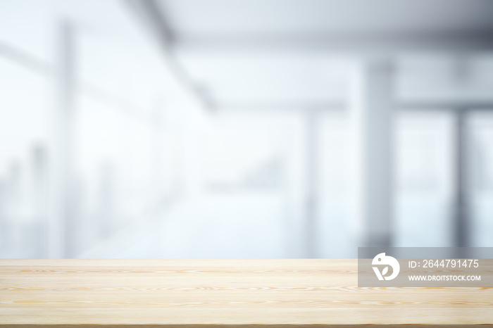 Empty office wooden table with clear modern interior with large window on background, closeup, mock 