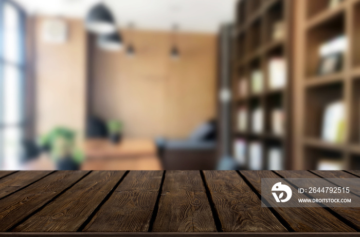 Wooden board empty Table Top And Blur Interior over blur in coffee shop Background, Mock up for disp
