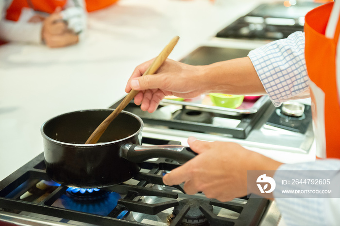 Chet cooking in hot pot