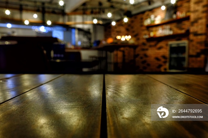 Close up Surface of Wooden Table in Cafe with Bokeh Background. (Selective Focus)