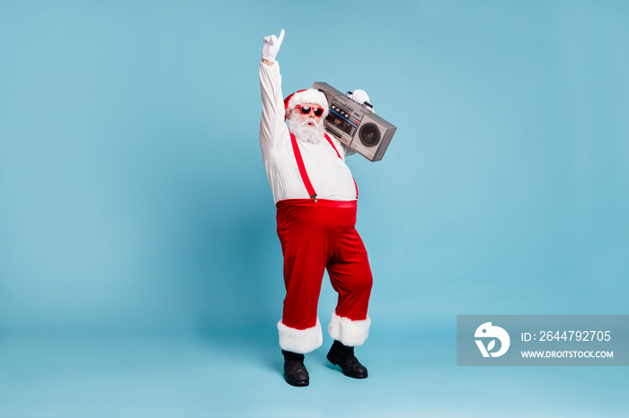Full length body size view of his he nice cool stylish cheerful Santa big belly pants carrying vinta