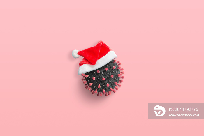 Coronavirus with Santa Claus hat concept