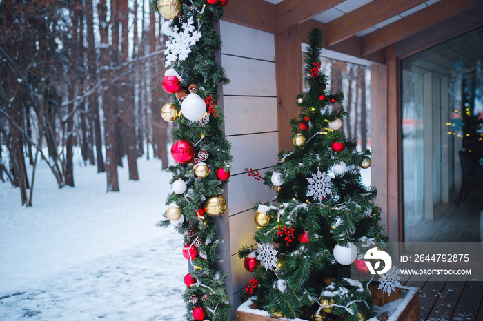 Beautiful decorated Christmas tree in a winter landscape with snow. idea and concept of winter holid