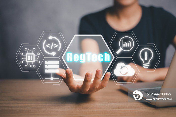 RegTech, Regulation Compliance financial control modern internet technology concept, Person hand hol