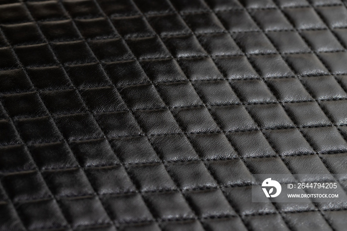 genuine leather with black rhombic stitching background and texture. black diamond leather pattern o