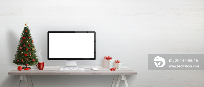 Computer with isolated white, blank screen for mockup on desk with free space for text beside. Chris