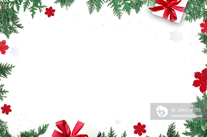 Fir branch and gift on white background with copy space for text. Christmas. Holiday concept.