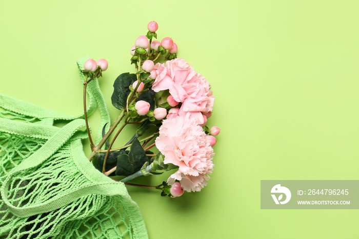 Bouquet of beautiful flowers on color background