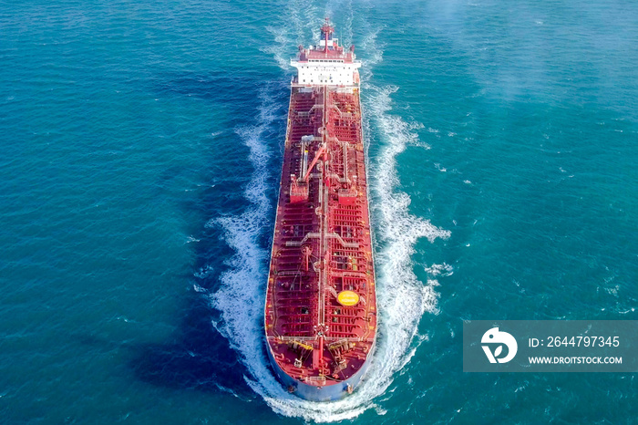 Large crude oil tanker roaring across The Mediterranean sea - Aerial image.