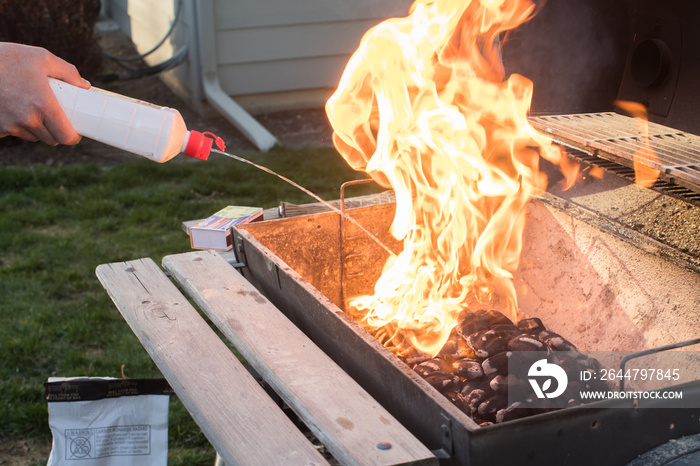 Starting barbecue briquettes with lighter fluid