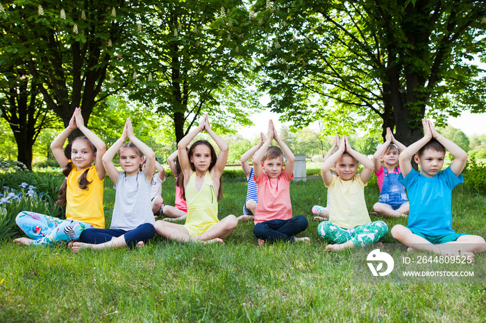 children practicing yoga.