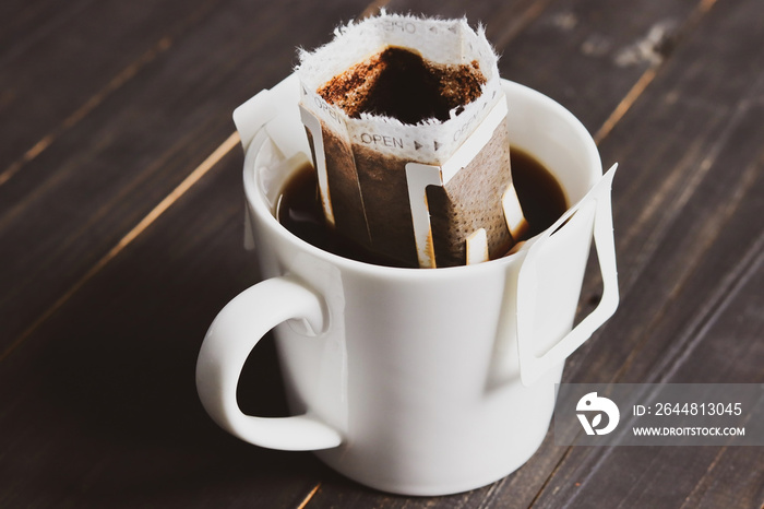 Drip or brewed coffee on wooden table