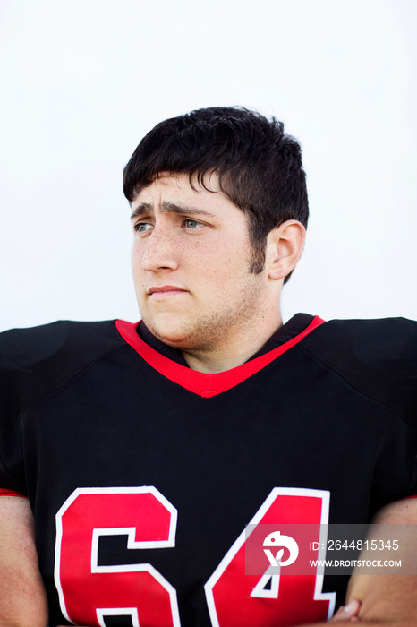 Studio portrait of football player (16-17)