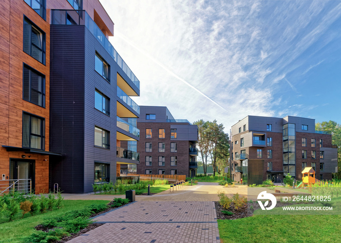 Benches at Modern european complex of apartment buildings