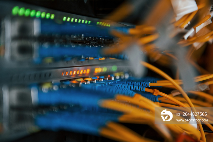 Close up view of internet equipment and cables in the server room