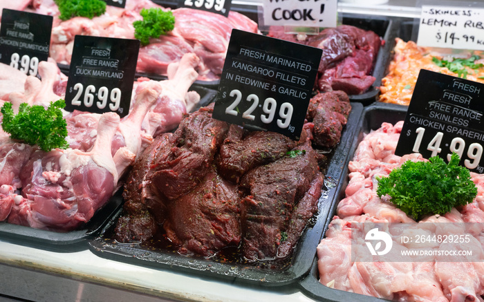 Raw Kangaroo meat inside a butchers shop window in Melbourne Australia