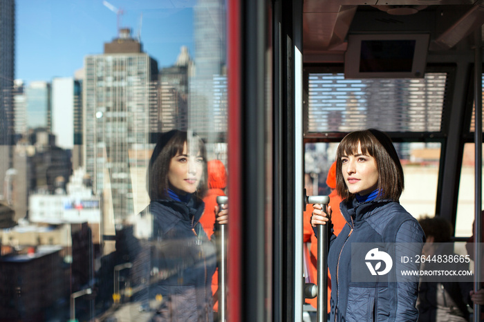 Young woman travelling by subway train