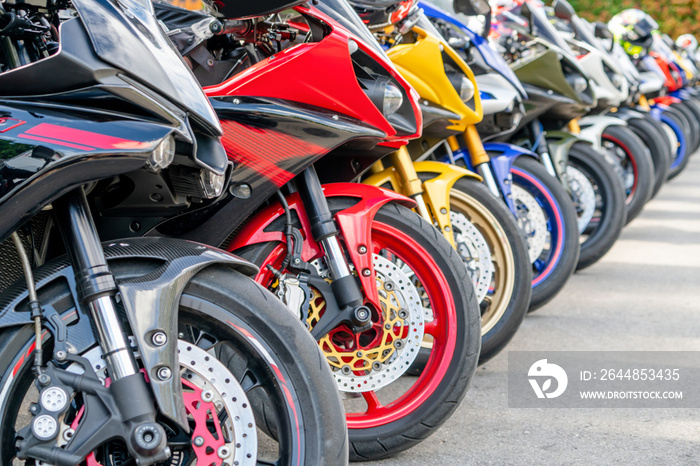 Motorcycles group parking on city street during adventure journey. Motorcyclists community travel co