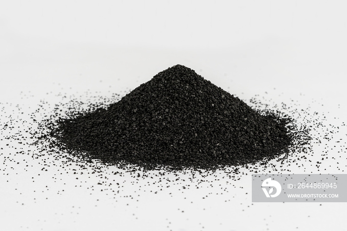 A pile of Activated Carbon. Raw material in water purifier..Activated Carbon on white background.