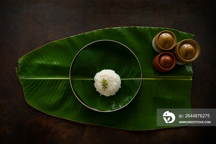 White rice on a banana leaf