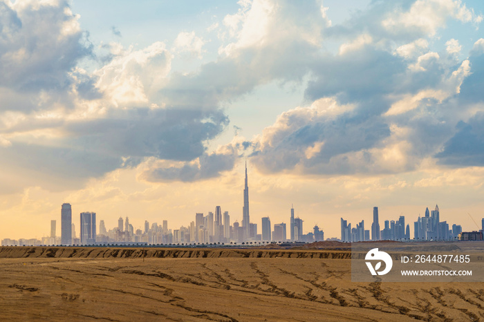 Dubai Downtown skyline with desert sand, United Arab Emirates or UAE. Financial district and busines