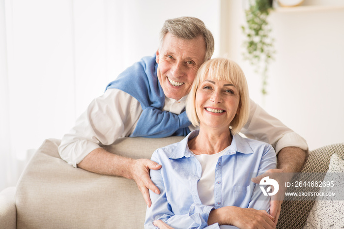 Love lives forever! Senior man hugging wife