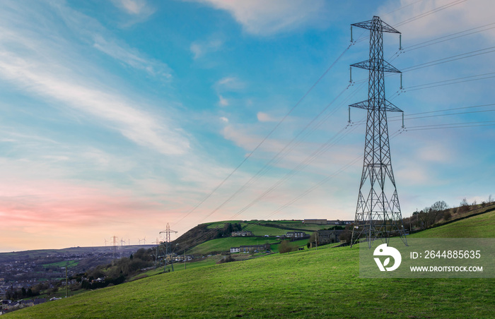 powerline in the countryside during sunset