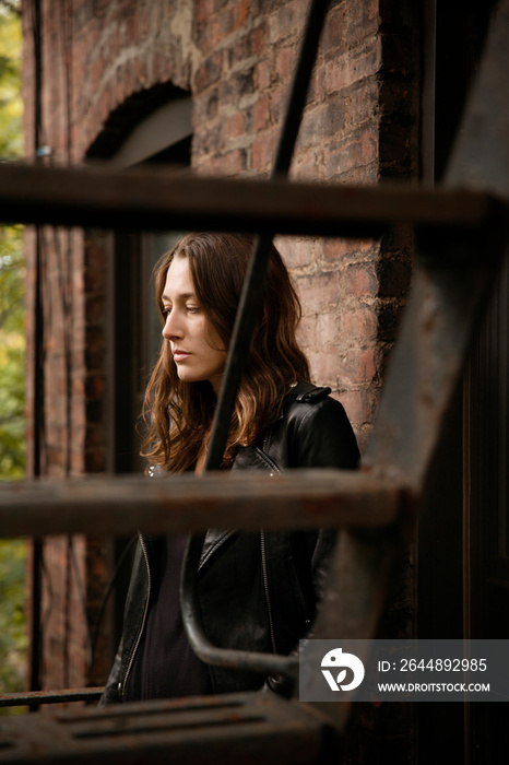 Young woman outside building