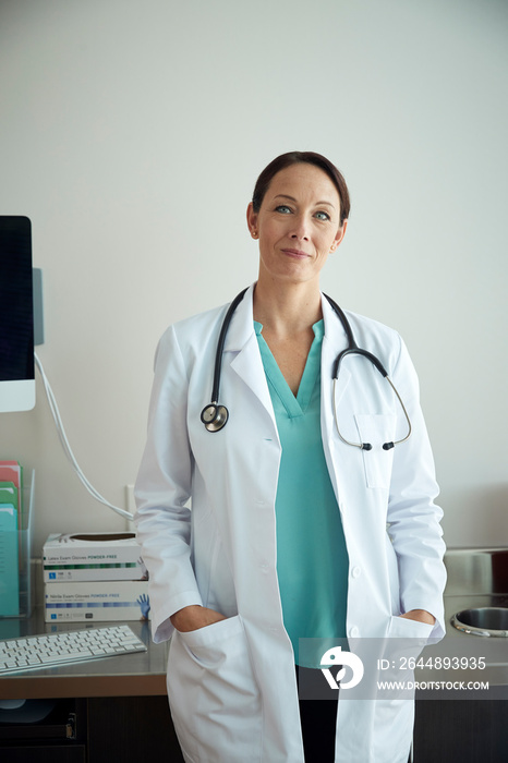 Doctor posing in medical office