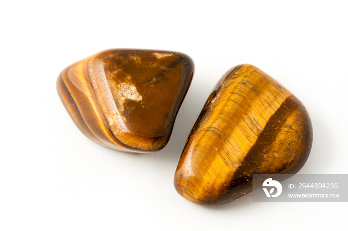 Macro stone mineral tigers eye on a white background