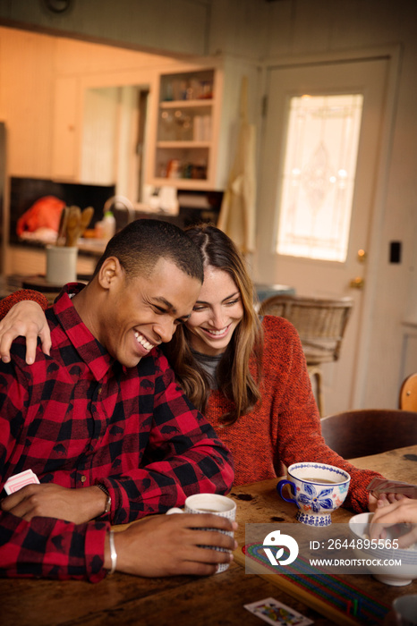 Couple smiling at home