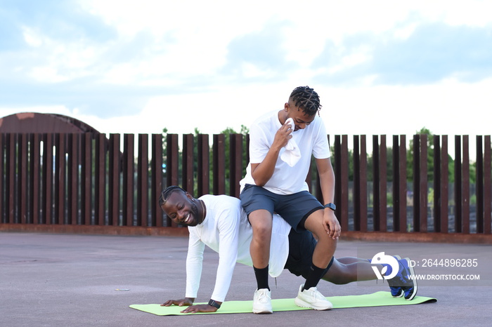 USA, Louisiana, Gay couple exercising outdoors