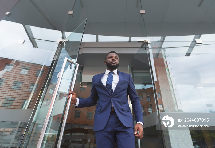 Personal bodyguard monitoring environment before boss will leave the building