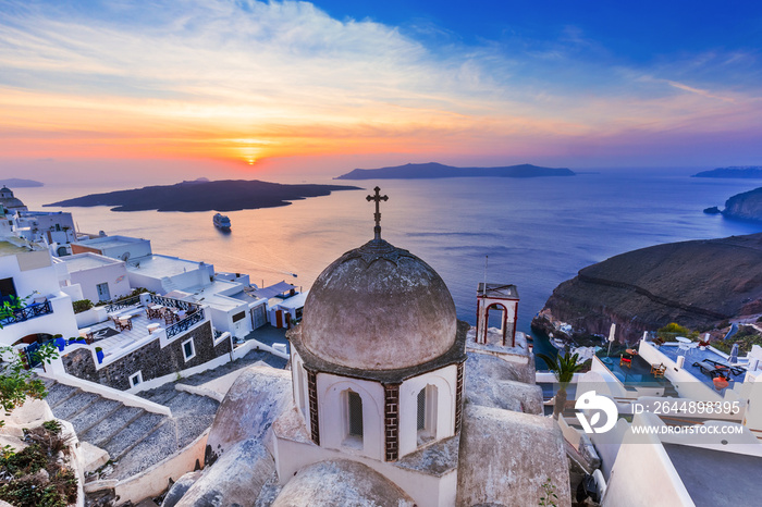 SantorSantorini, Greece. The picturesque Fira village at sunset.