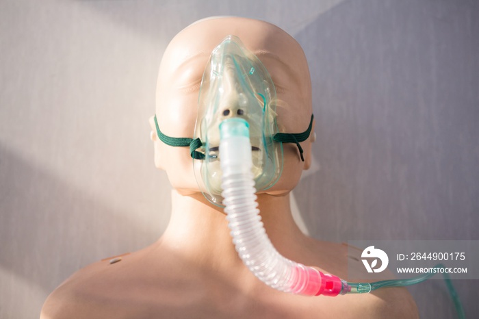 Close-up of dummy with oxygen mask