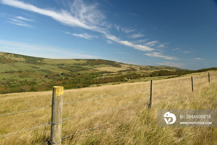 Coastal footpath above farmland near Tyneham in Dorset on the south coast