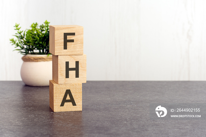 word FHA made with wood building blocks