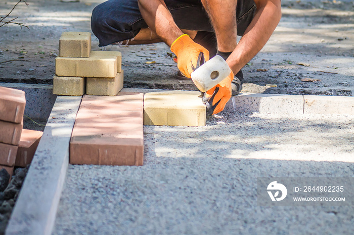 laying of paving slabs