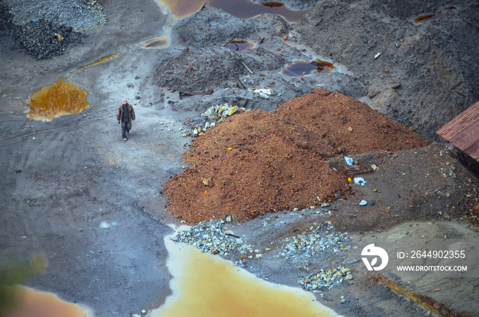 Distant view of unrecognizable worker walking trough silver mines. Cerro Rico in Potosi, Bolivia, South America. The richest mine of the colonial exploitation in the Spanish conquest in Latin America