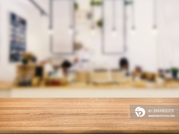 wooden counter top with bakery shop blurred background