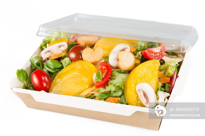 salads in takeaway carton container on white background